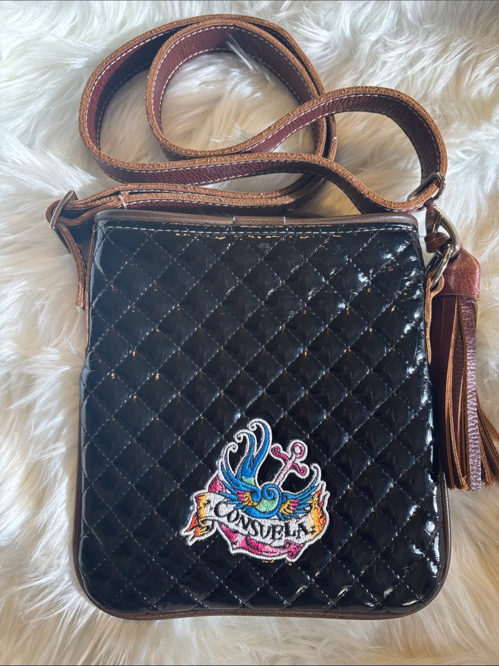 Consuela Black Quilted Crossbody with Multi-Color Embroidered Logo